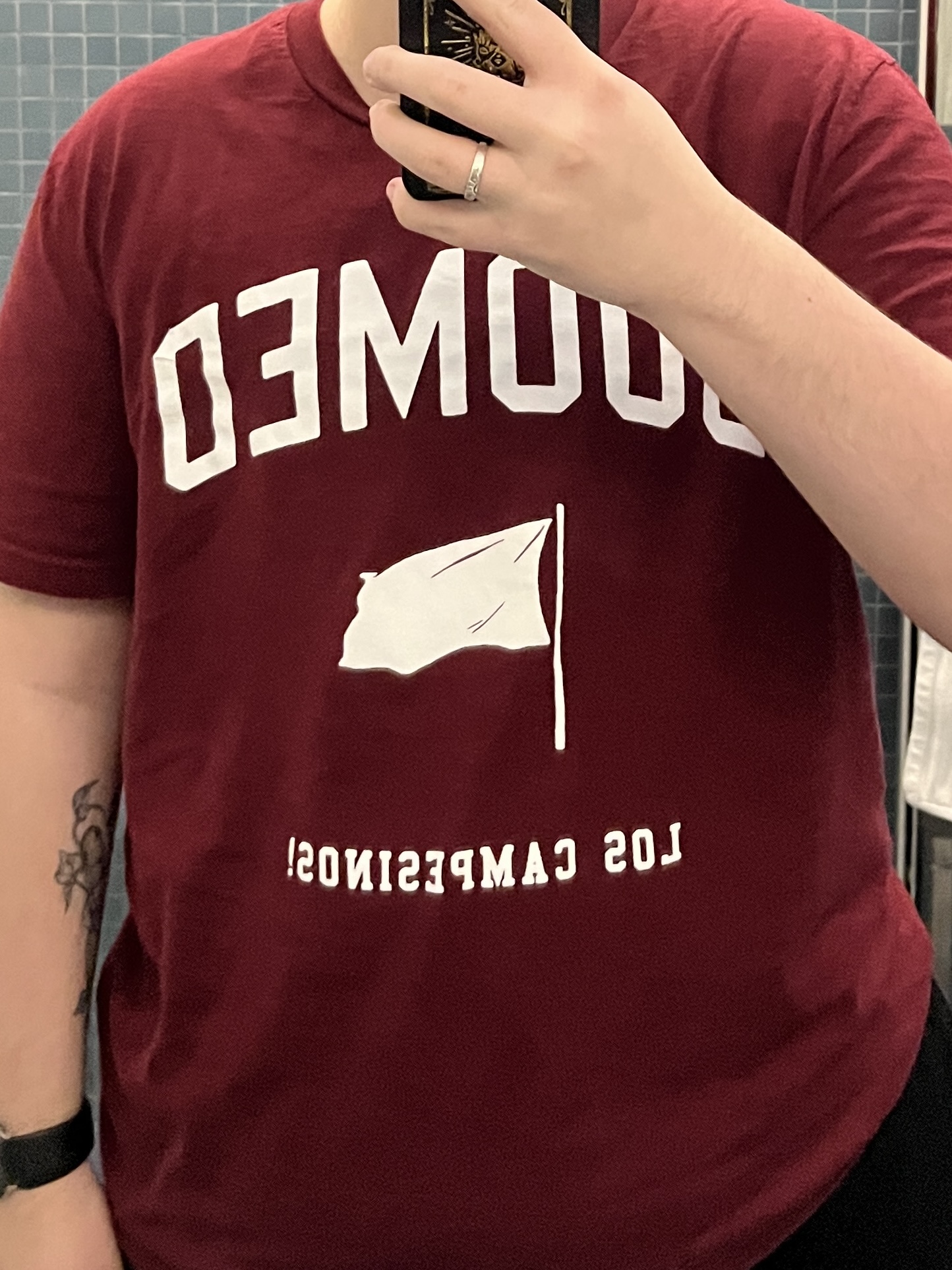 Trans man wearing a red shirt